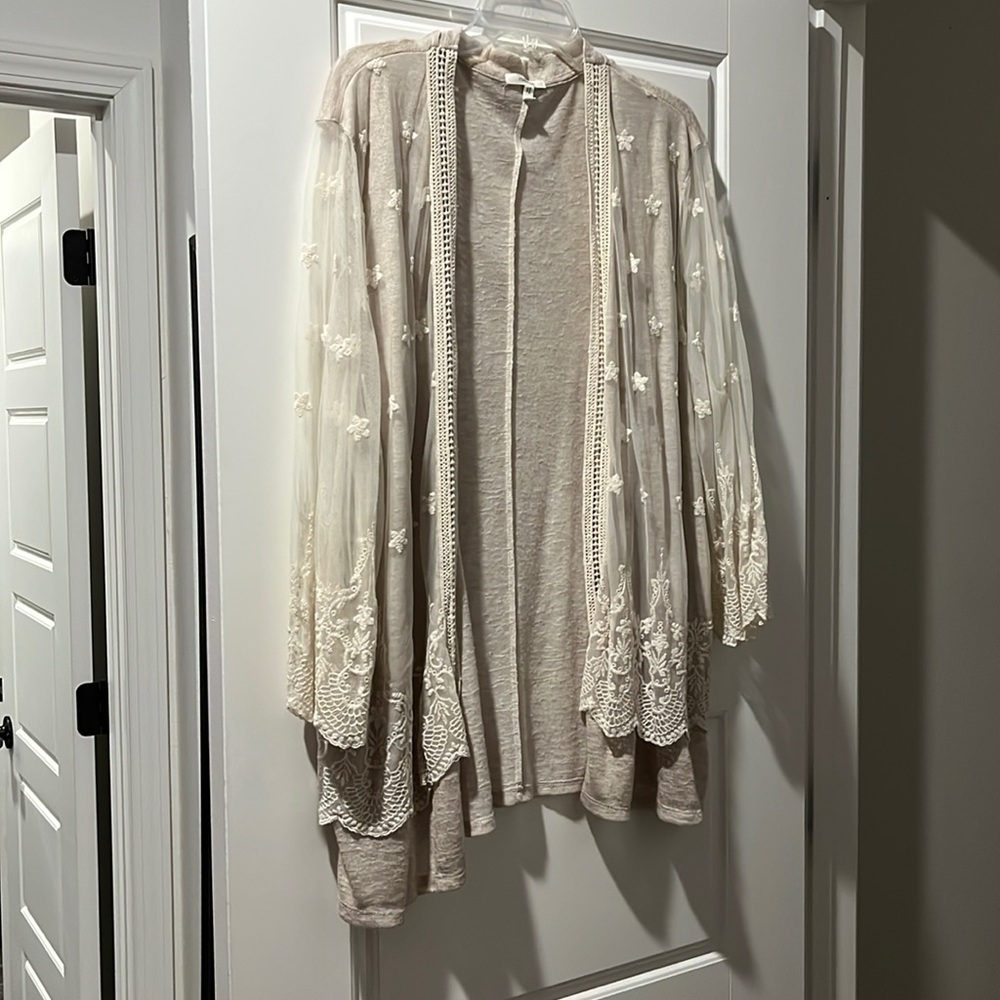 Maurice’s cardigan.